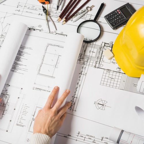 crop-architect-opening-blueprint_1477063-Copy